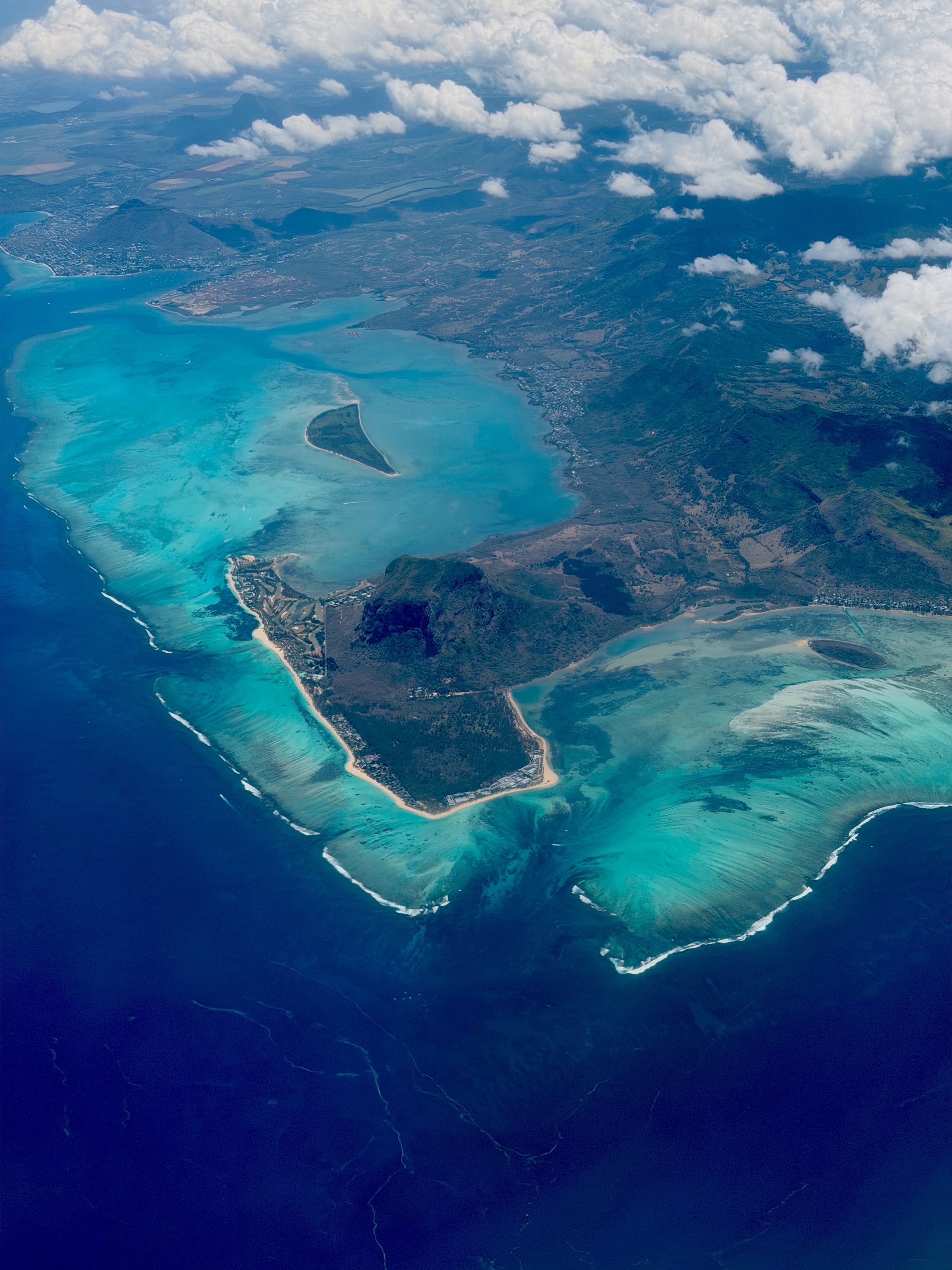 Aerial view of the turquoise lagoon and reef at Le Morne Brabant, Mauritius